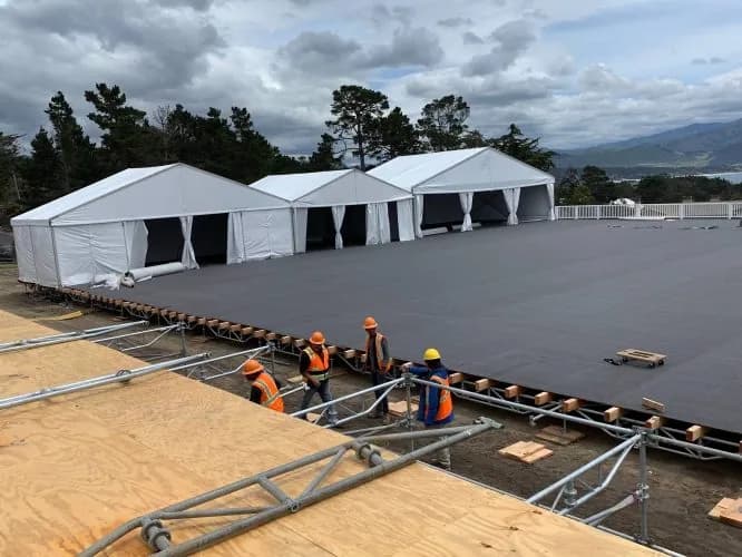 Installing subfloor at the US Open