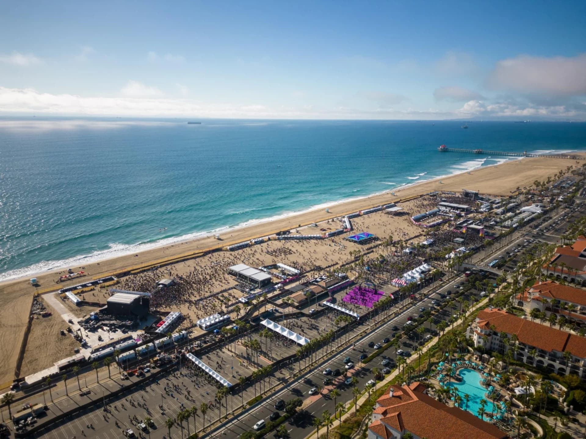 Aerial view of festival stages and temporary structures along the coastline