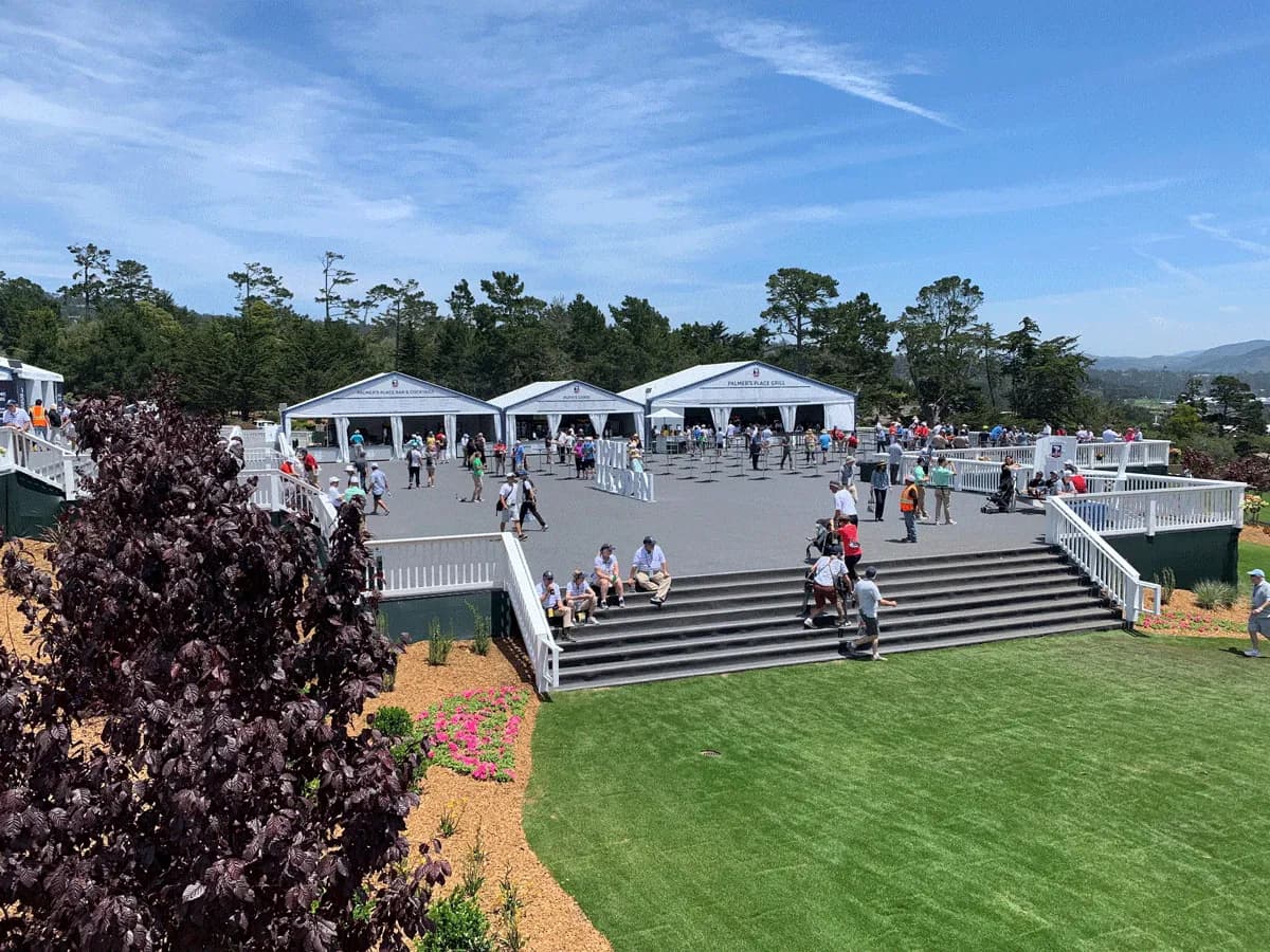 US Open a-frame tents on subfloor with spectator steps