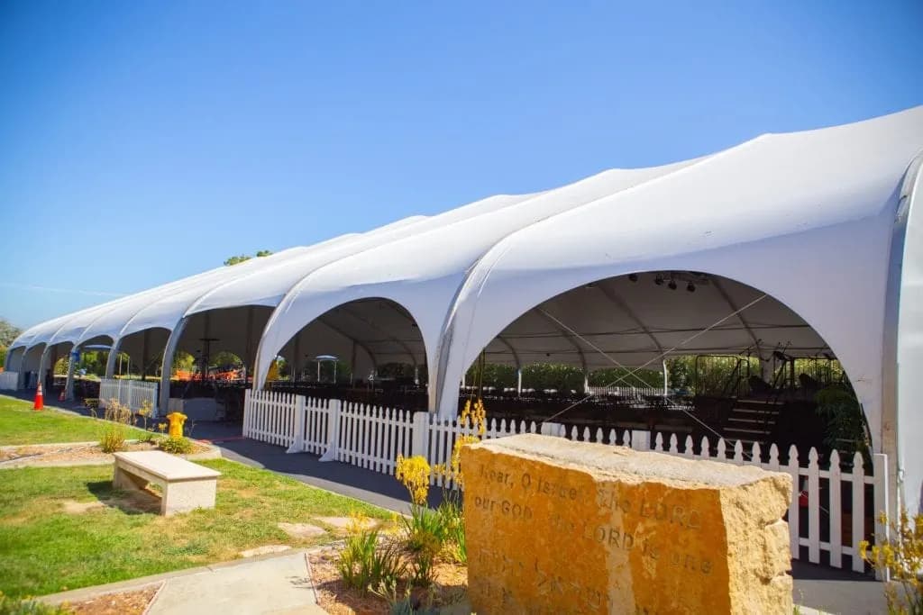 Open tent structure for venue