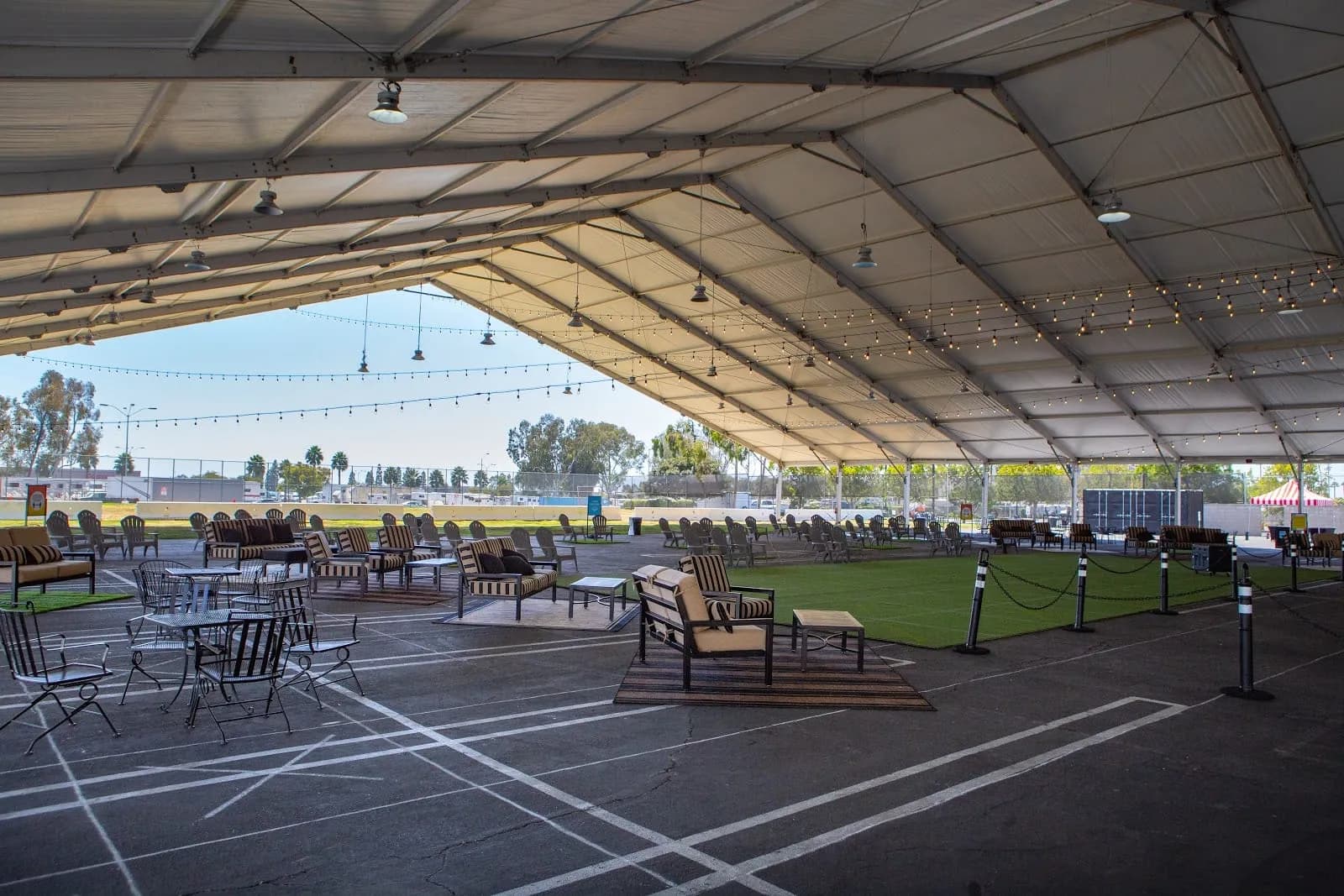 open outdoor setting under large tent structure
