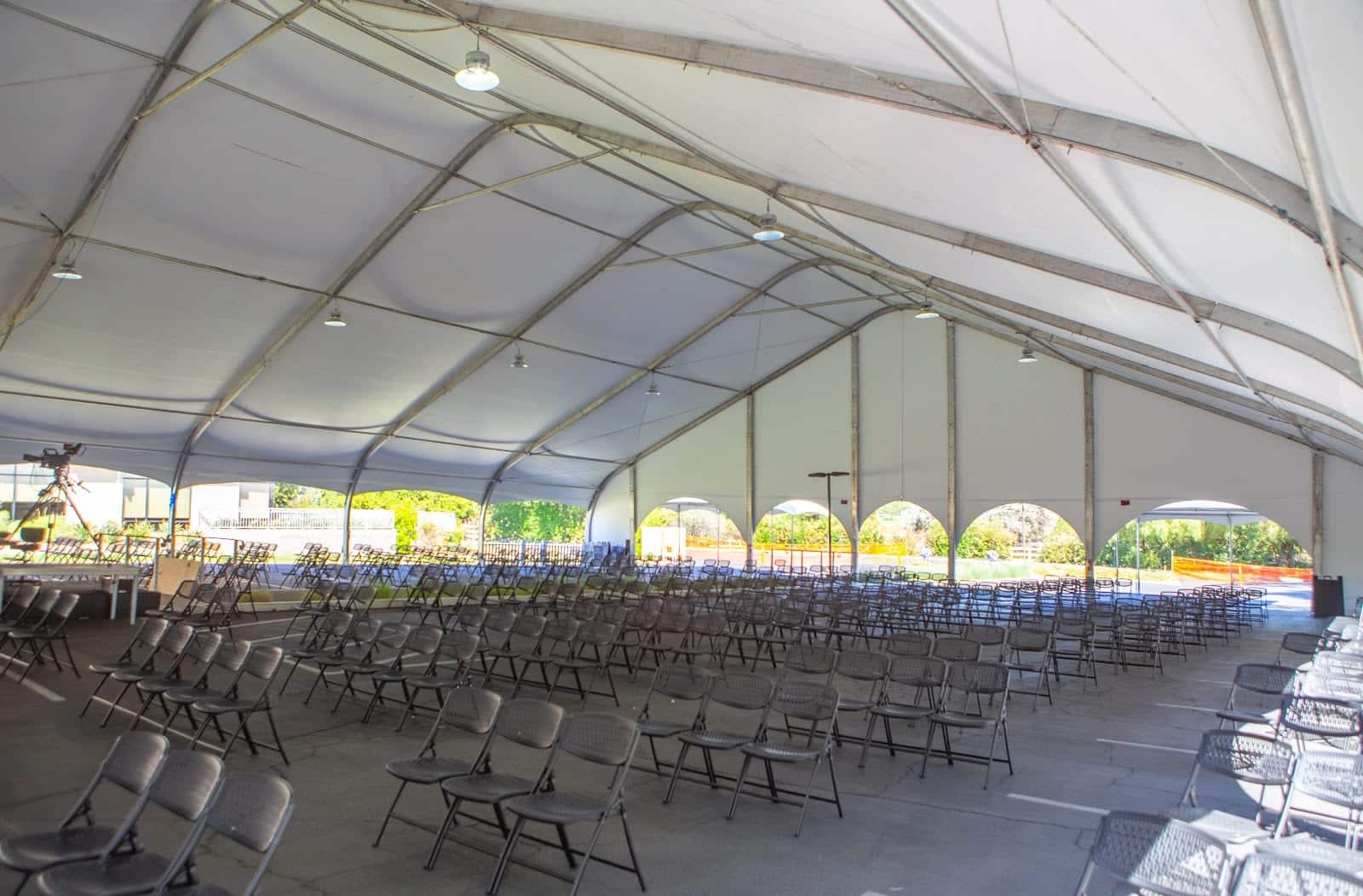 Empty outdoor seminar under large tent